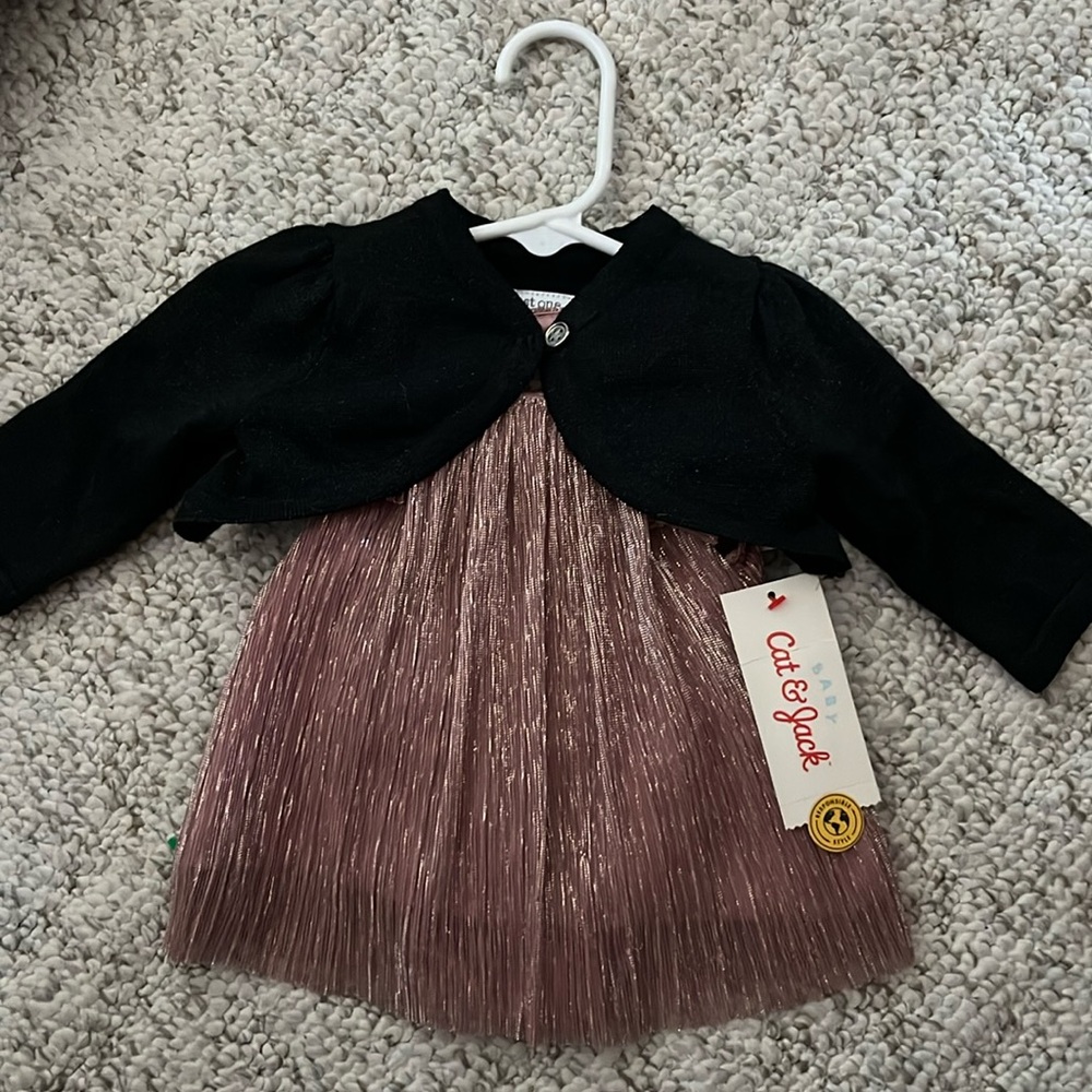 Newborn shimmery rose gold dress & black jacket. Perfect for new baby photos!
